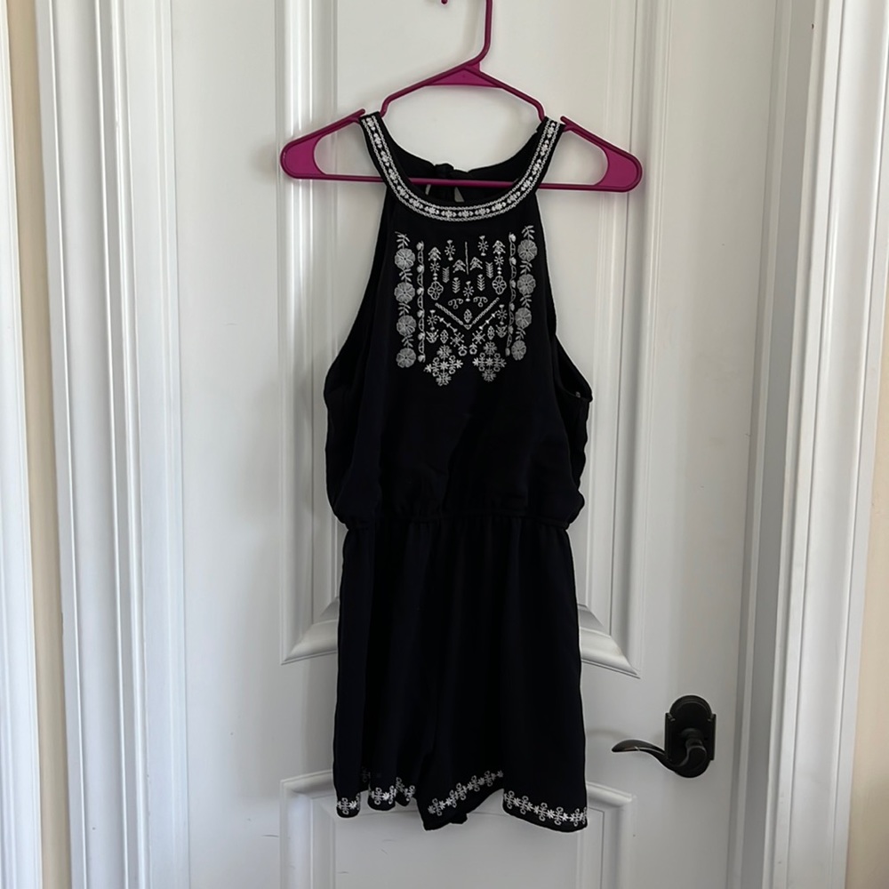 Black romper with white sticking